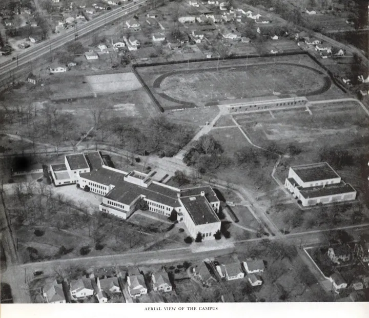 Aerial view showing Webster’s school buildings, grounds and stadium.