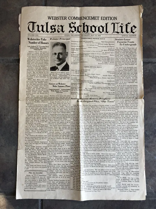Photographed newspaper page: commencement edition — front page.