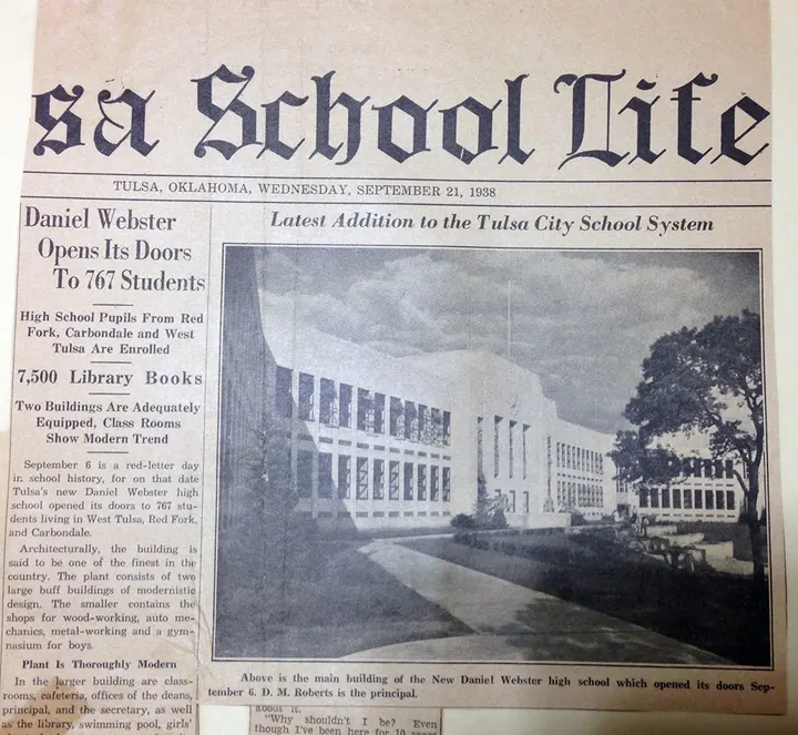 A newspaper clipping reporting Webster’s opening beside a campus photograph.
